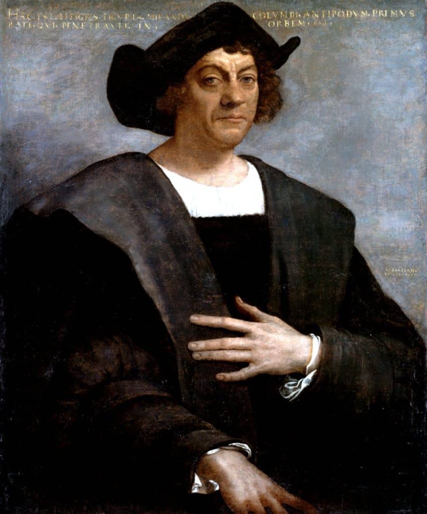Retrato histórico de Cristóbal Colón con un fondo de mapa antiguo que alude al debate sobre su lugar de nacimiento